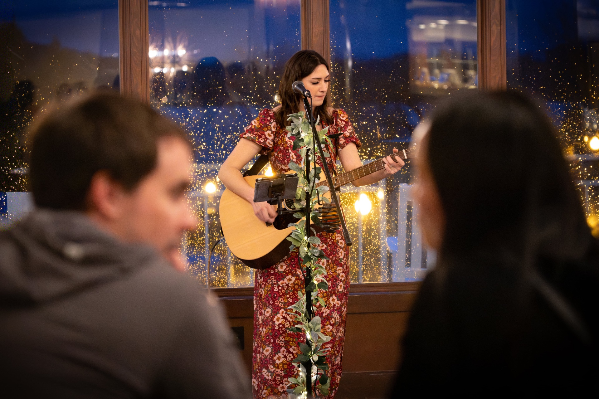 Anna Marie performing live at an evening venue